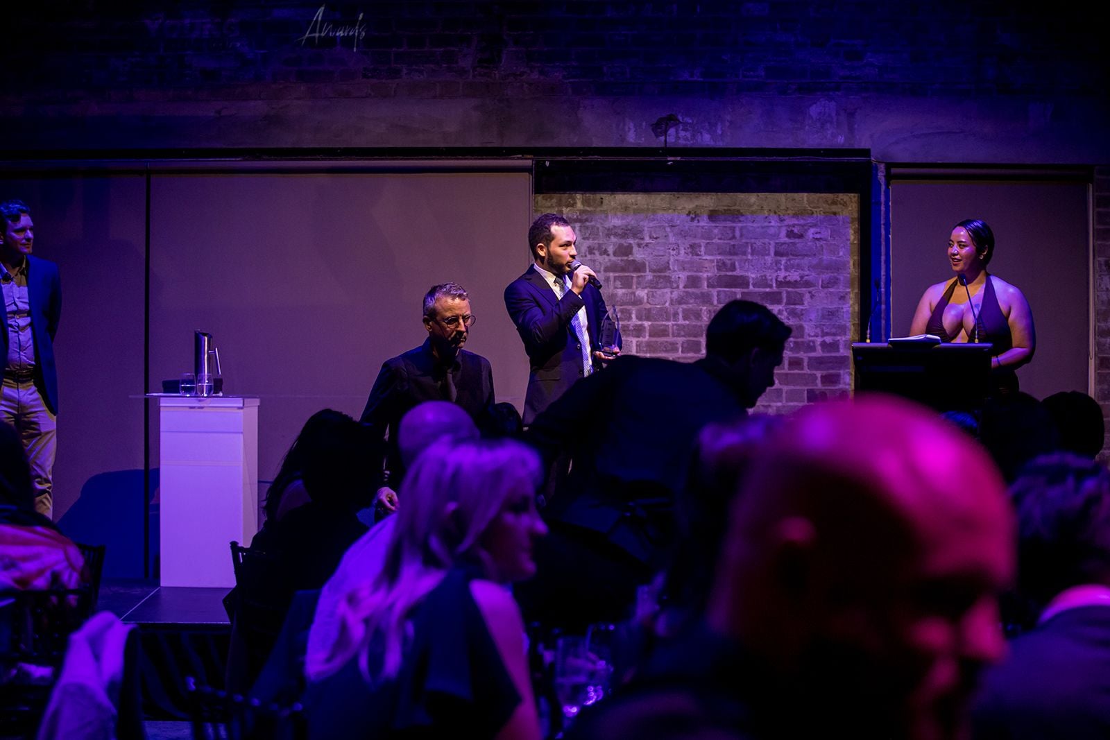 2025 Sydney Young Entrepreneur Awards Gala dinner Winners accepting trophies on stage at the 2025 Sydney Young Entrepreneur Awards
